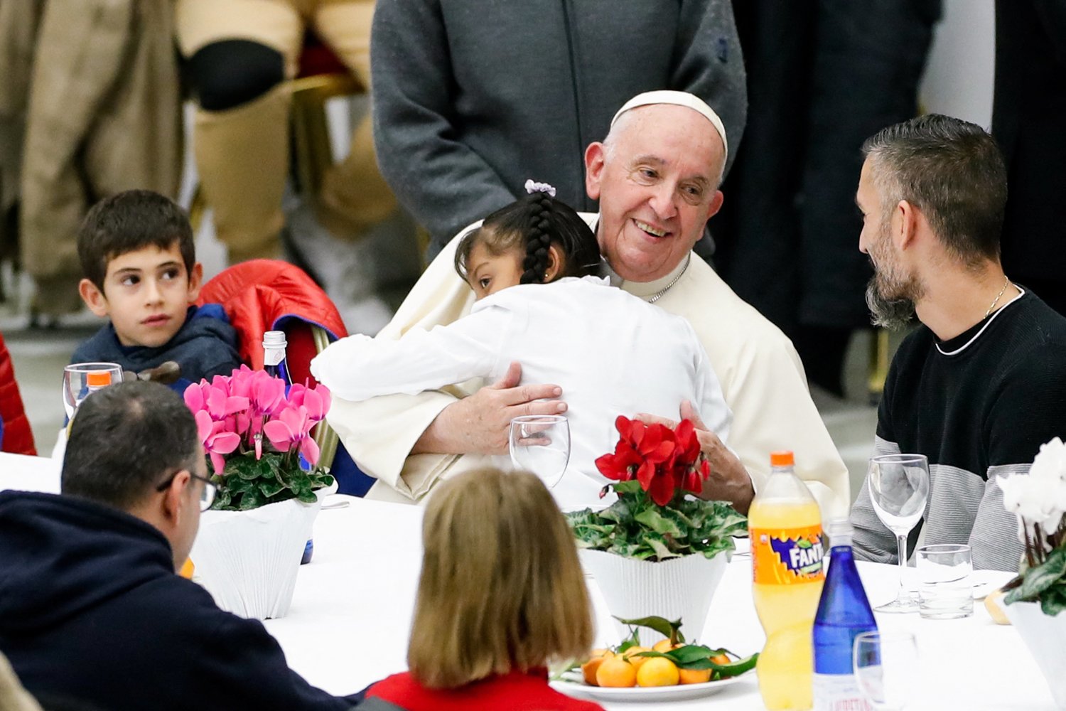 Pope Francis joins some 1,300 guests for lunch in the Vatican audience hall on the World Day of the Poor Nov. 13.