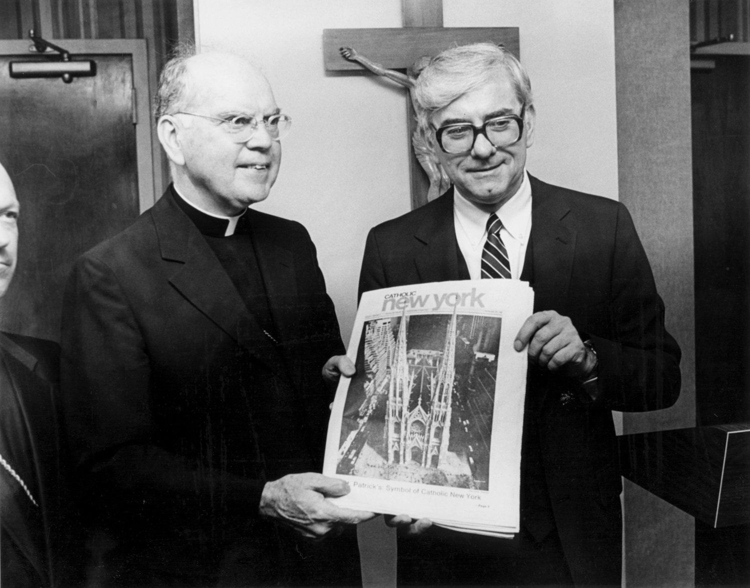 DEBUT ISSUE—Cardinal Terence Cooke, then-Archbishop of New York, and CNY’s founding editor Gerald M. Costello share a grip on the initial issue of Catholic New York dated Sept. 27, 1981. At 88 pages, CNY was a hefty read for the archdiocese and signaled a new path of engagement in communications.